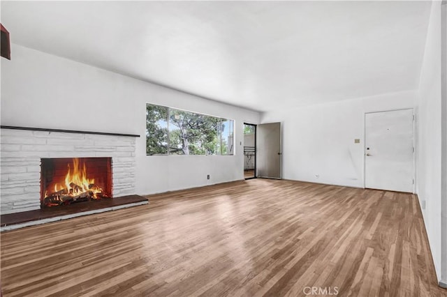 305 Raymondale Dr Unit L, South Pasadena, CA 91030 - unfurnished living room with wood finished floors and a fireplace