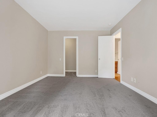 16879 Bluewater Ln Unit 25, Huntington Beach, CA 92649 - empty room with carpet floors and baseboards