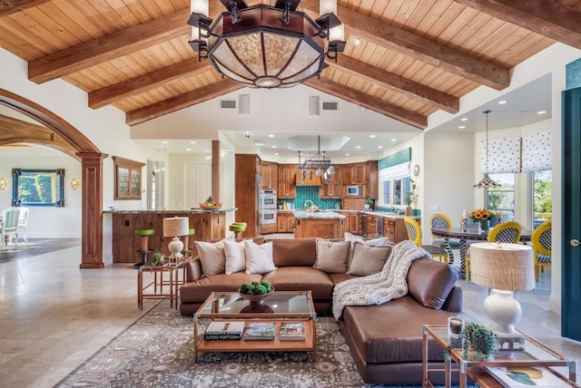 4843 La Jacaranda, Rancho Santa Fe, CA 92067 - living room featuring wood ceiling, a chandelier, recessed lighting, light tile patterned flooring, and decorative columns