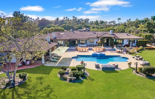 4843 La Jacaranda, Rancho Santa Fe, CA 92067 - view of pool featuring a yard, a pool with connected hot tub, and a patio
