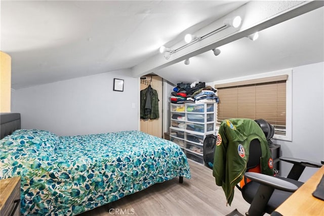 2011 W Katella Ave Unit 17, Anaheim, CA 92804 - bedroom with wood finished floors and lofted ceiling