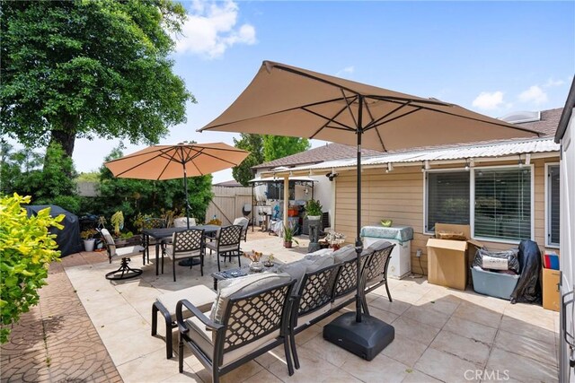 2011 W Katella Ave Unit 17, Anaheim, CA 92804 - view of patio / terrace featuring outdoor dining space and a grill
