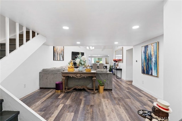 2011 W Katella Ave Unit 17, Anaheim, CA 92804 - living room featuring wood finished floors, baseboards, recessed lighting, stairs, and a chandelier