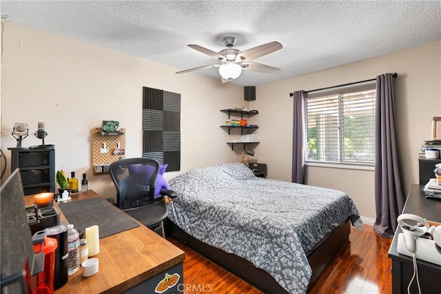 2011 W Katella Ave Unit 17, Anaheim, CA 92804 - bedroom with wood finished floors, a textured ceiling, and ceiling fan
