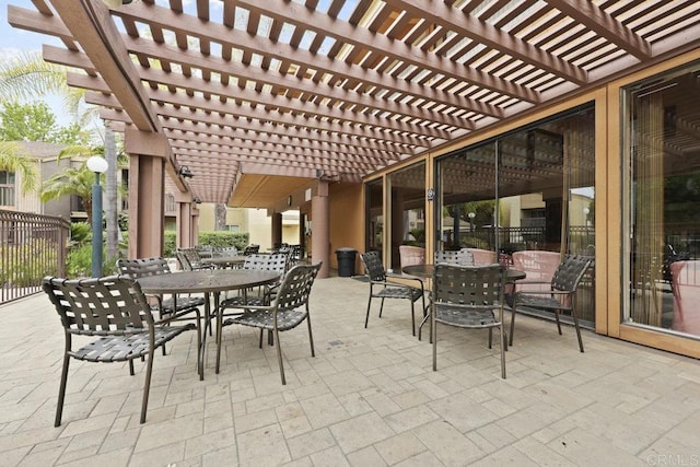 5938 Rancho Mission Rd Unit 133, San Diego, CA 92108 - view of patio with outdoor dining space and a pergola