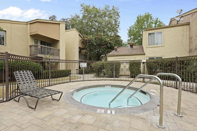 5938 Rancho Mission Rd Unit 133, San Diego, CA 92108 - view of swimming pool with a community hot tub