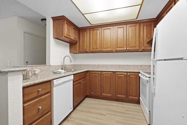 5938 Rancho Mission Rd Unit 133, San Diego, CA 92108 - kitchen featuring white appliances, a sink, and brown cabinets