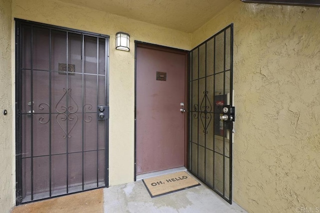 5938 Rancho Mission Rd Unit 133, San Diego, CA 92108 - entrance to property featuring stucco siding