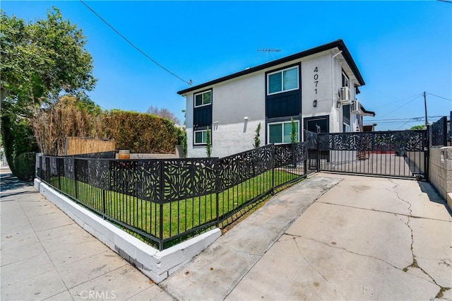4071 Melrose Ave Unit 1, Los Angeles, CA 90029 - view of side of property featuring stucco siding and a gate