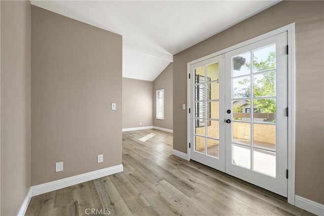 1202 Monte Sereno Dr, Thousand Oaks, CA 91360 - doorway to outside with french doors, plenty of natural light, lofted ceiling, light wood-type flooring, and baseboards