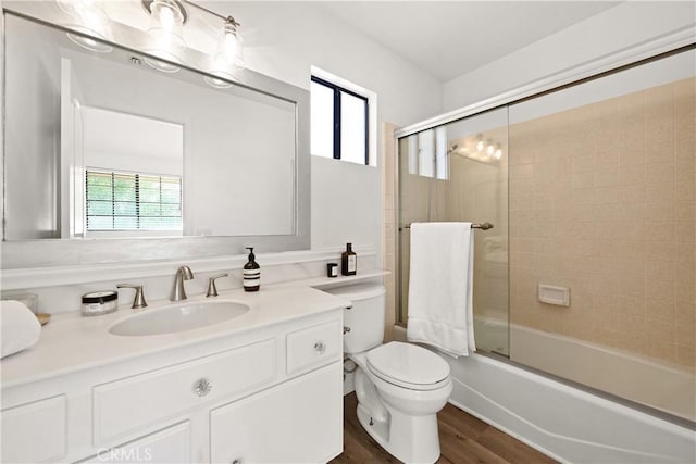 1202 Monte Sereno Dr, Thousand Oaks, CA 91360 - full bath with vanity, toilet, wood finished floors, and shower / bath combination with glass door