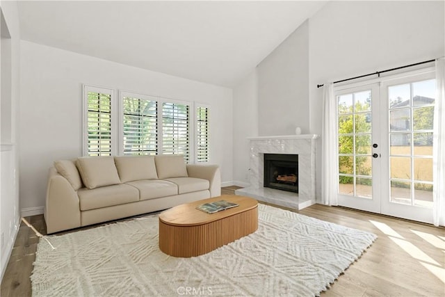 1202 Monte Sereno Dr, Thousand Oaks, CA 91360 - living area with wood finished floors, plenty of natural light, french doors, and high vaulted ceiling