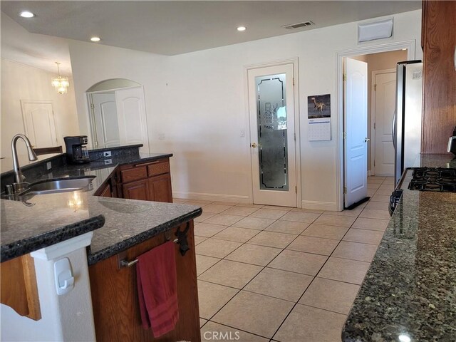 26538 Mainsail Ln, Helendale, CA 92342 - kitchen with a sink, light tile patterned flooring, freestanding refrigerator, baseboards, and recessed lighting