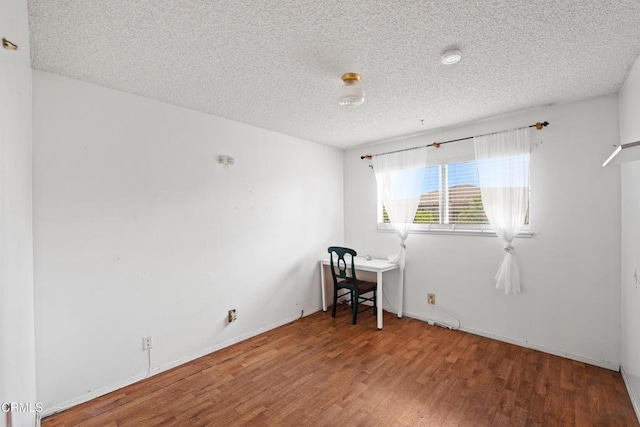 4320 Hamilton Ave, Oxnard, CA 93033 - unfurnished room with a textured ceiling and wood finished floors