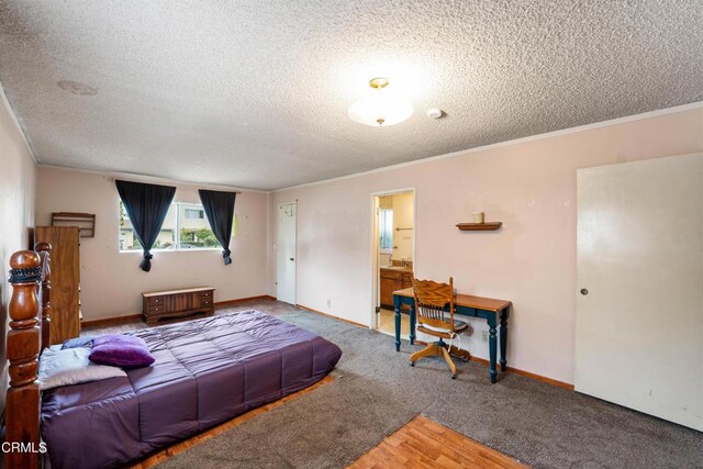 4320 Hamilton Ave, Oxnard, CA 93033 - carpeted bedroom featuring a textured ceiling, crown molding, and ensuite bathroom