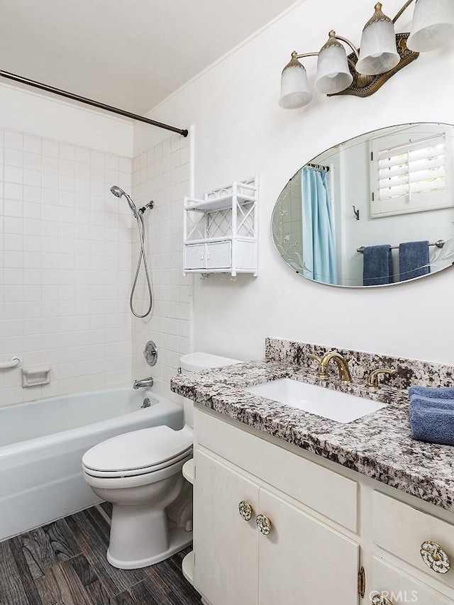 1045 S Orange Grove Blvd Unit 4, Pasadena, CA 91105 - full bathroom featuring vanity, shower / bath combo with shower curtain, toilet, and wood finished floors
