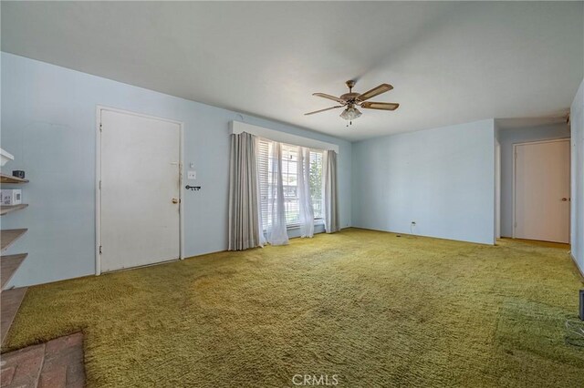 1640 Shirley St, Merced, CA 95341 - unfurnished living room featuring a ceiling fan and carpet floors