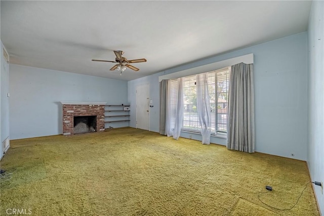 1640 Shirley St, Merced, CA 95341 - unfurnished living room featuring carpet flooring, a ceiling fan, and a brick fireplace