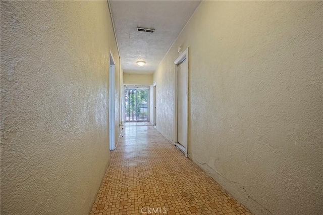 1640 Shirley St, Merced, CA 95341 - hall with a textured wall and light floors