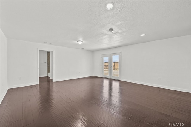 18531 E Palmdale Blvd, Palmdale, CA 93591 - spare room with dark wood finished floors, a textured ceiling, baseboards, and recessed lighting