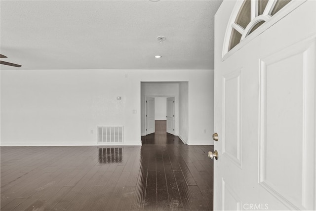 18531 E Palmdale Blvd, Palmdale, CA 93591 - spare room featuring dark wood finished floors, a ceiling fan, recessed lighting, and a textured ceiling