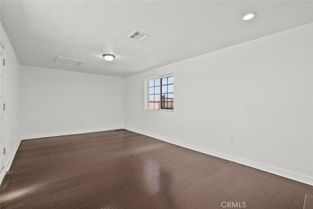 18531 E Palmdale Blvd, Palmdale, CA 93591 - unfurnished room with baseboards and dark wood finished floors