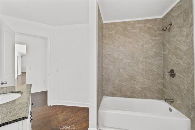 18531 E Palmdale Blvd, Palmdale, CA 93591 - full bathroom with wood finished floors, vanity, and shower / tub combination