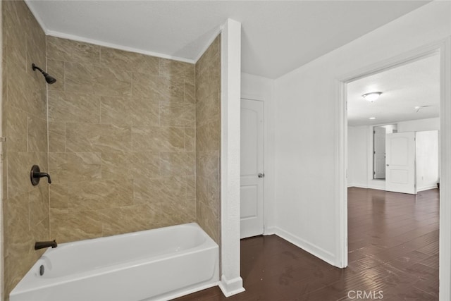 18531 E Palmdale Blvd, Palmdale, CA 93591 - bathroom with wood finished floors, baseboards, and shower / tub combination