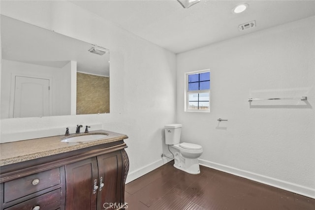 18531 E Palmdale Blvd, Palmdale, CA 93591 - bathroom featuring baseboards, toilet, vanity, and wood finished floors
