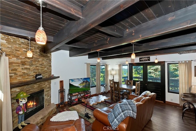28545 Wabash Dr, Lake Arrowhead, CA 92352 - living room with wood finished floors, healthy amount of natural light, baseboards, a fireplace, and wooden ceiling with exposed beams