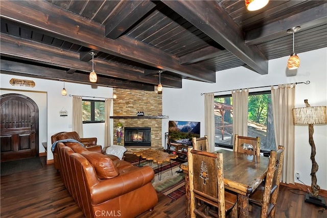 28545 Wabash Dr, Lake Arrowhead, CA 92352 - living area with wood finished floors, baseboards, a stone fireplace, and wooden ceiling with exposed beams