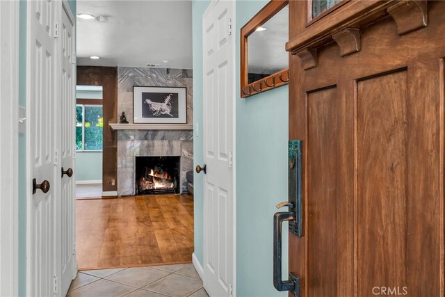 17508 Strathern St, Northridge, CA 91325 - corridor featuring light tile patterned floors and baseboards