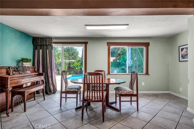 17508 Strathern St, Northridge, CA 91325 - dining space featuring light tile patterned flooring and baseboards