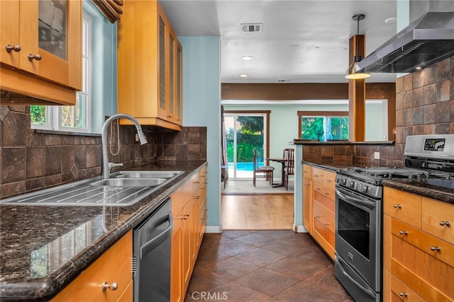 17508 Strathern St, Northridge, CA 91325 - kitchen featuring appliances with stainless steel finishes, wall chimney range hood, backsplash, plenty of natural light, and recessed lighting