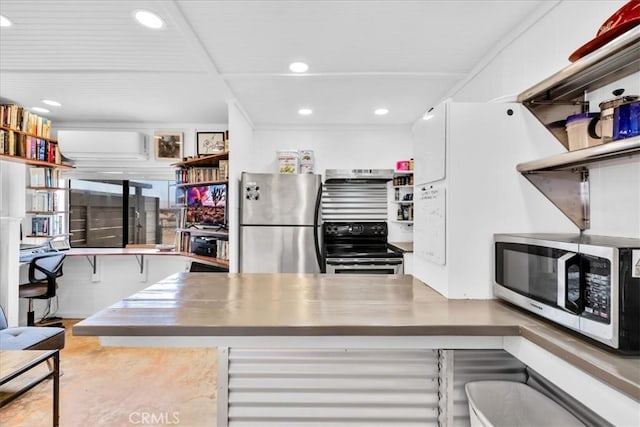 84951 Amboy Rd Unit 29, Palms, CA 92277 - kitchen featuring appliances with stainless steel finishes, recessed lighting, extractor fan, open shelves, and a wall mounted air conditioner