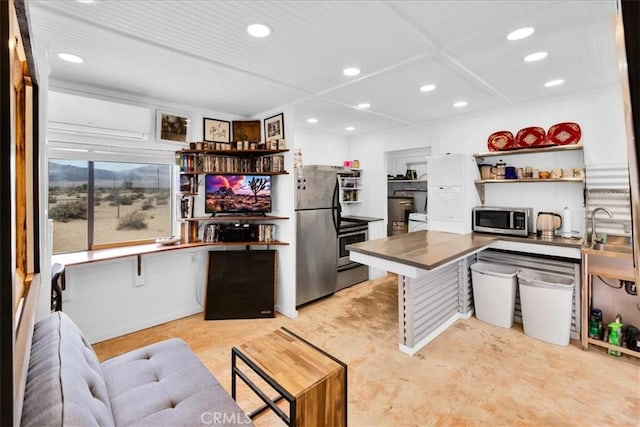 84951 Amboy Rd Unit 29, Palms, CA 92277 - kitchen featuring appliances with stainless steel finishes, open shelves, recessed lighting, a sink, and coffered ceiling