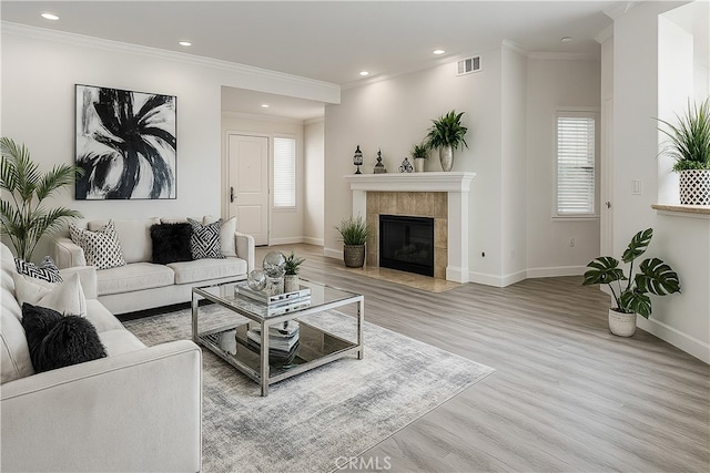 24982 La Pantera, Laguna Niguel, CA 92677 - living room with wood finished floors, ornamental molding, recessed lighting, and a tile fireplace