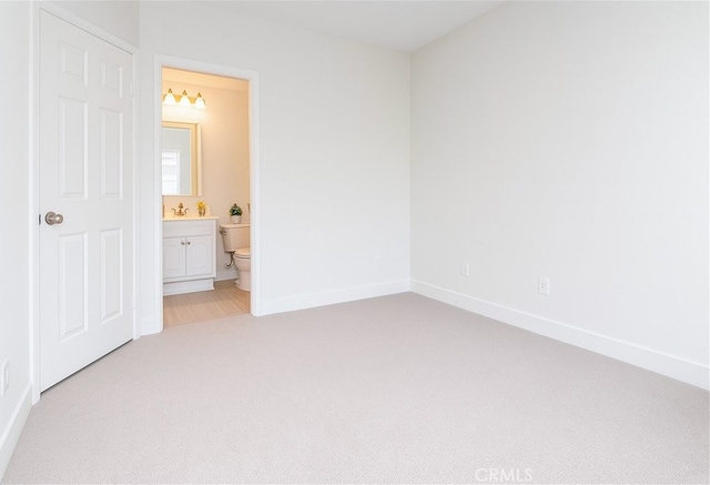24982 La Pantera, Laguna Niguel, CA 92677 - unfurnished bedroom featuring light colored carpet and ensuite bathroom