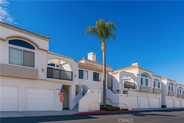 24982 La Pantera, Laguna Niguel, CA 92677 - view of building exterior featuring stairs and a garage