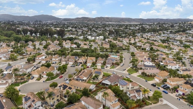 305 Cobblestone Pl, Santee, CA 92071 - aerial overview of property's location featuring a mountainous background and nearby suburban area