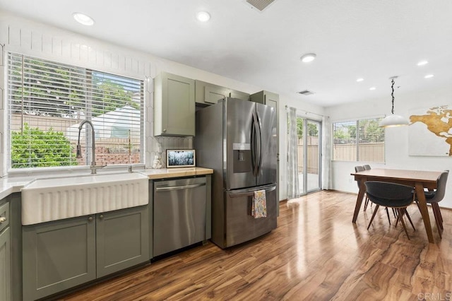 305 Cobblestone Pl, Santee, CA 92071 - kitchen featuring appliances with stainless steel finishes, dark wood finished floors, light countertops, and recessed lighting