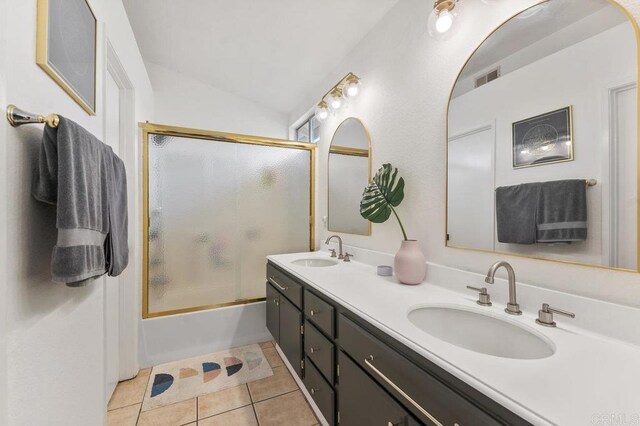 305 Cobblestone Pl, Santee, CA 92071 - bathroom featuring double vanity, tile patterned flooring, shower / bath combination with glass door, and vaulted ceiling