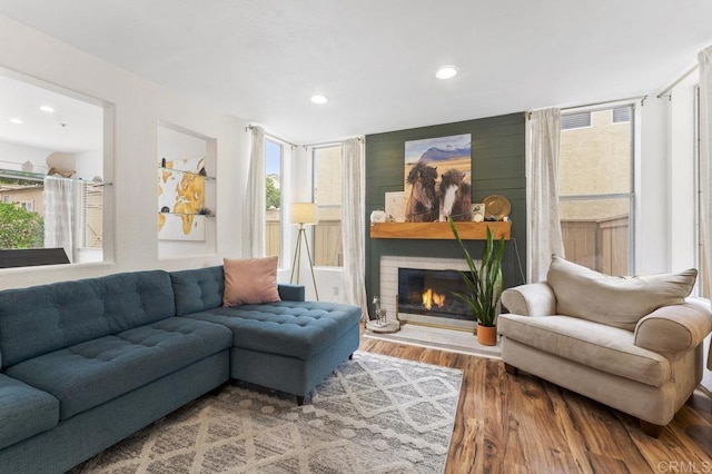 305 Cobblestone Pl, Santee, CA 92071 - living room with wood finished floors, recessed lighting, and a fireplace
