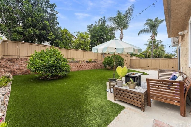 305 Cobblestone Pl, Santee, CA 92071 - fenced backyard with a patio and an outdoor fire pit