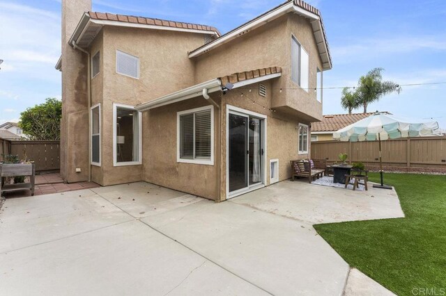 305 Cobblestone Pl, Santee, CA 92071 - rear view of house with stucco siding and a patio