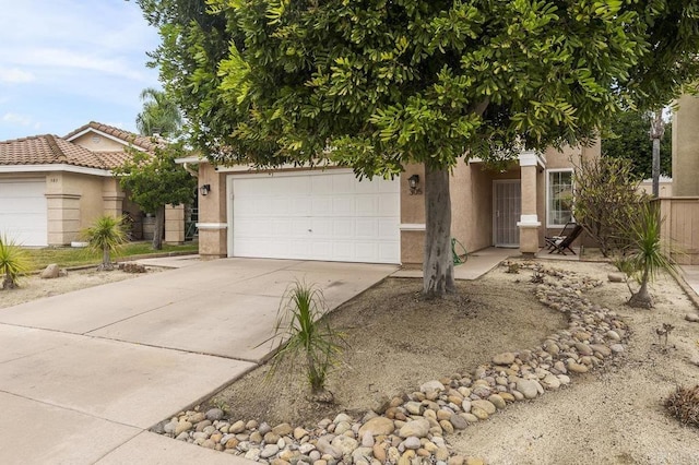 305 Cobblestone Pl, Santee, CA 92071 - view of property hidden behind natural elements with stucco siding, concrete driveway, and a garage