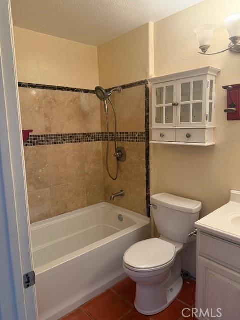 19 Softwind, Aliso Viejo, CA 92656 - bathroom featuring vanity, shower / washtub combination, tile patterned floors, and a textured ceiling