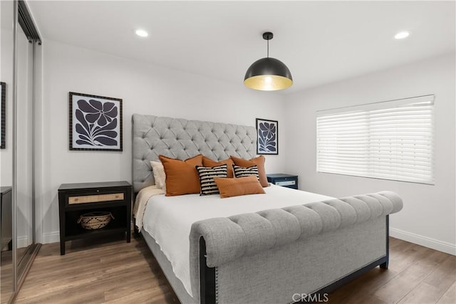 1831 E Appleton St Unit 4, Long Beach, CA 90802 - bedroom with wood finished floors, baseboards, and recessed lighting