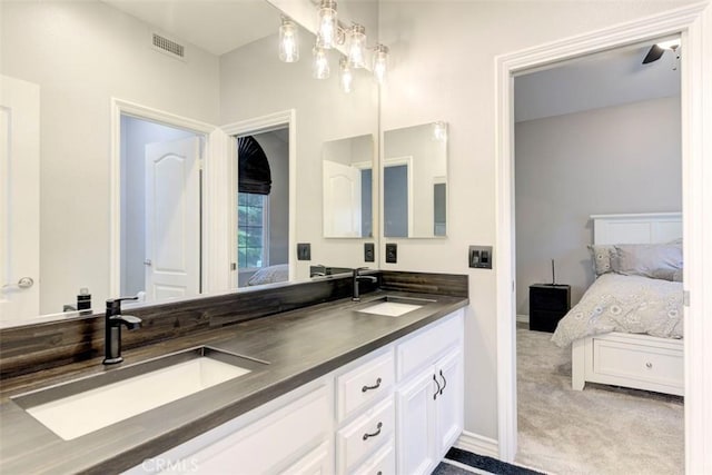 12 Thorn Oak, Rancho Santa Margarita, CA 92679 - full bathroom featuring ensuite bathroom, double vanity, and baseboards