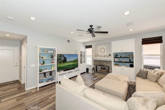 12 Thorn Oak, Rancho Santa Margarita, CA 92679 - living room with healthy amount of natural light, dark wood finished floors, recessed lighting, a fireplace, and a ceiling fan
